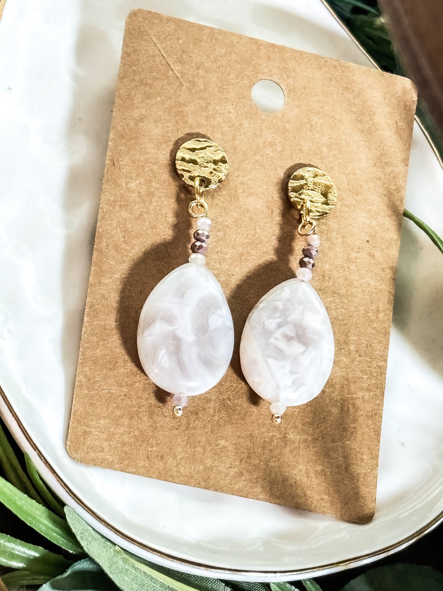 Light grayish white teardrop earrings