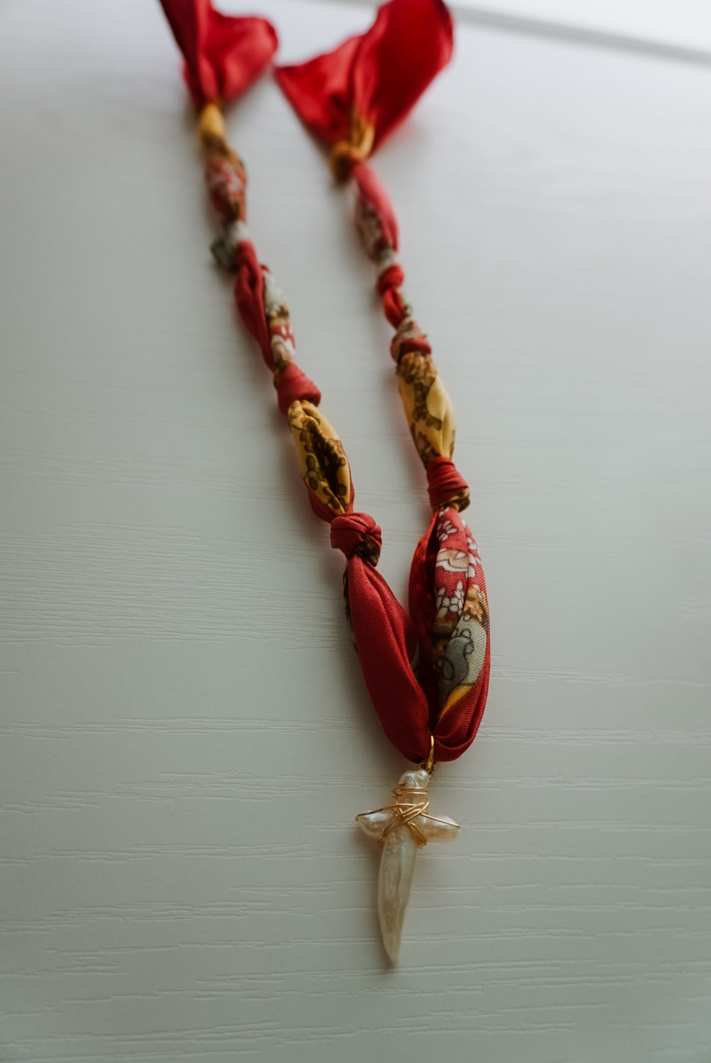 Red Mesa Cross Silk Necklace